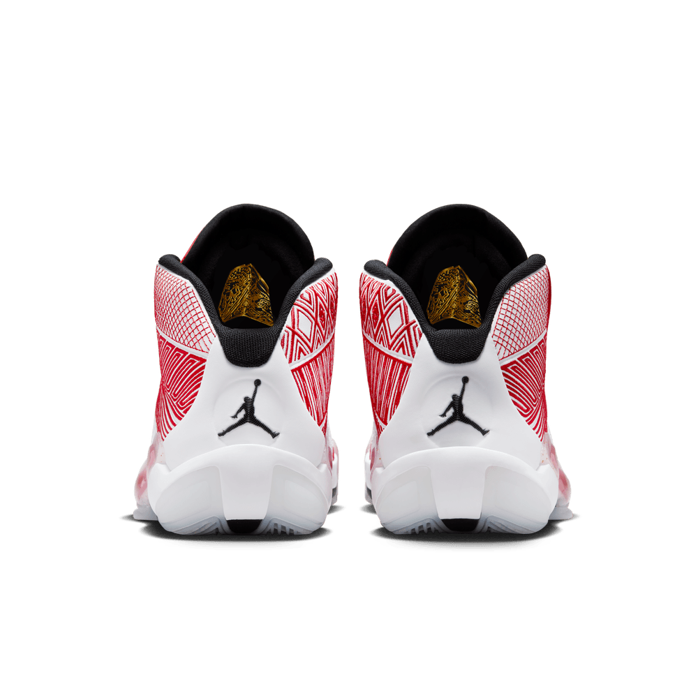white gold and red jordans